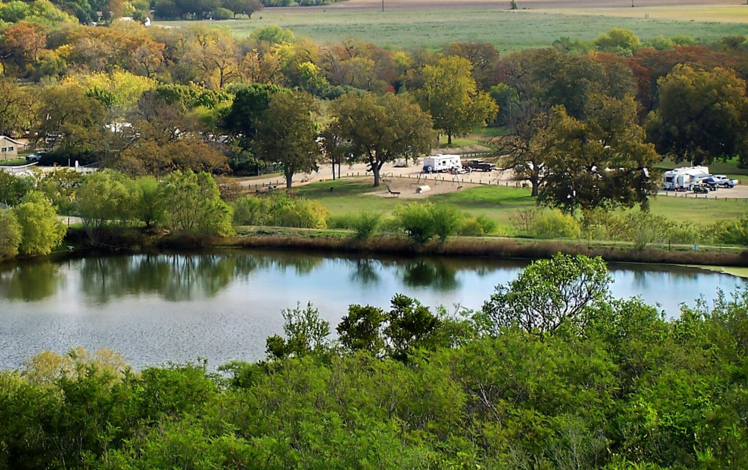 Pond and RV Park with Playground at Regional Park
